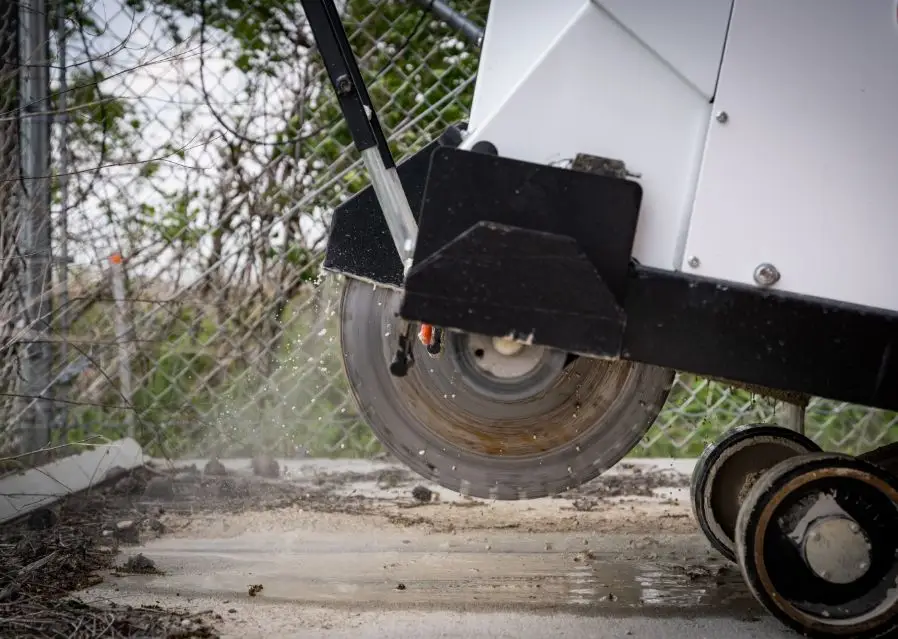 A saw over concrete